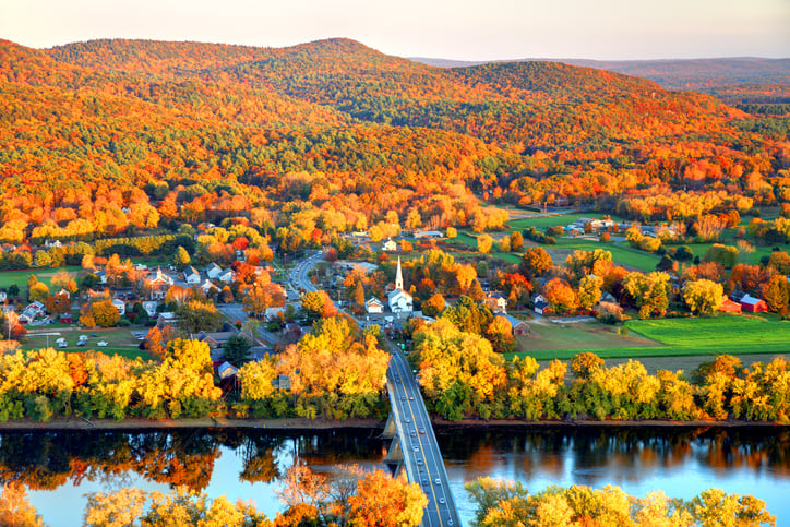 Aerial image of a church along a river in the Connecticut River winding through the Pioneer valley region of Massachusetts.